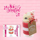 Cute kawaii bunny Peppermint Bark white ice cream tall sundae that has red and white layers in the dish and a peppermint candy cane holding a brown and white tag. The tag reads We wish you a merry Christmas and a happy new year, and the bunny has bits of peppermint candy on top as well as swirl of whipped cream.  The front of the character card is shown as well as the word scented.