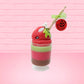Cute kawaii bunny tall red green and brown ice cream sundae with green glaze and a swirl of whipped cream up top. In the top of the bunny is a bony finger with the poison apple acrylic keychain attached to it. This view is from the side.