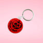 Close up of the Poison Apple keychain front. 