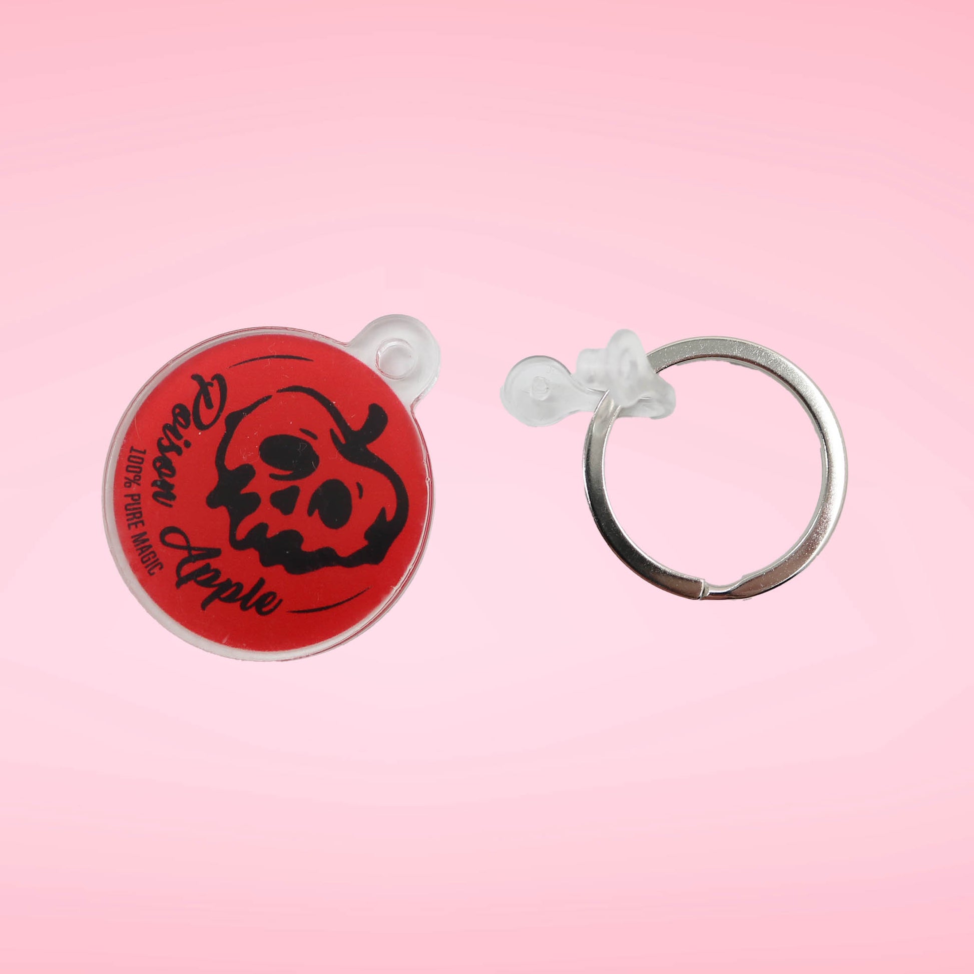 Close up of the Poison Apple keychain separated from key ring.