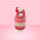 Cute kawaii bunny tall Strawberry Parfait Sundae red ice cream with strawberries, a pearl, and a whipped cream swirl on the top of the bunny. This view is from the back.