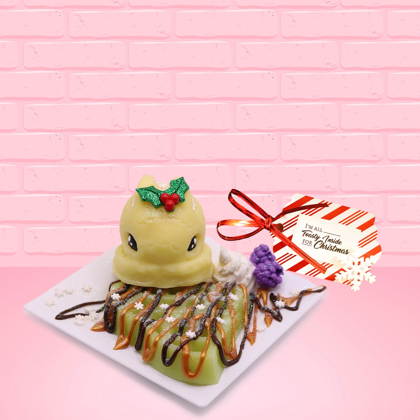 The front of the figure is shown with a sign “I’m all toasty inside for Christmas.”
