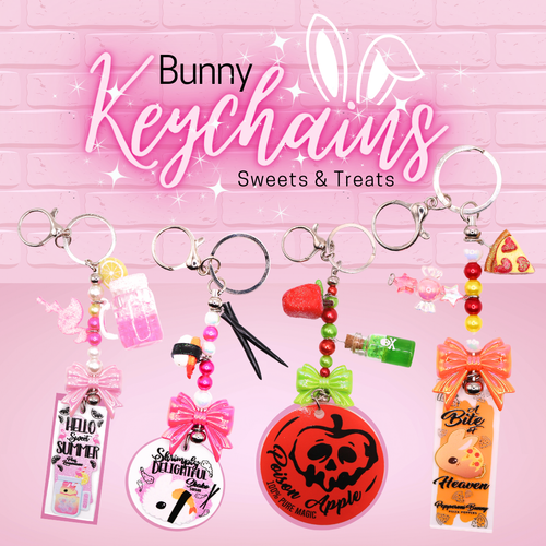 Four colorful acrylic keychains with silver keyrings are displayed against a pink brick wall background with a 'Bunny Keychains Sweets & Treats' logo at the top. The keychains feature various themed charms, including a pink drink, a witch hat, a red pumpkin, and a slice of pizza.